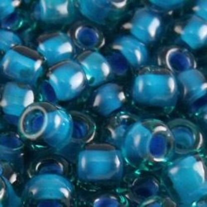Picture of Aqua Colorlined Teal Seed Bead #399O / Size 8<br />Approximately 25 Grams