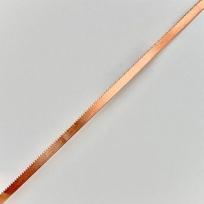 Picture of Copper Serrated Bezel, 3/16 Inch x 28 Gauge. 10 Ft.